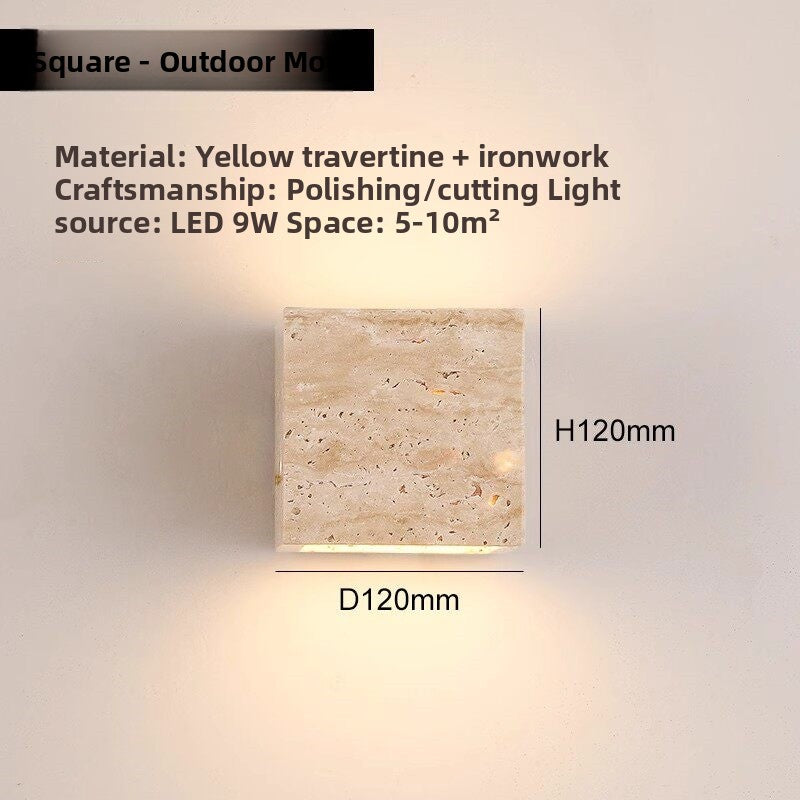 Travertine LED sconce shown with mounting bracket and screws for wall fitting
