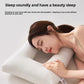 Contoured cotton side sleeper pillow with a hollow ear relief center and neck ridge, striped