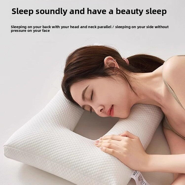 Contoured cotton side sleeper pillow with a hollow ear relief center and neck ridge, striped