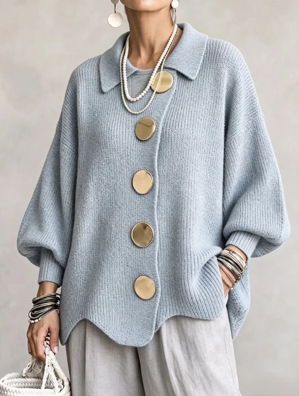 Light blue ribbed knit top with a collar and gold tone metal buttons, Sky blue option, size L