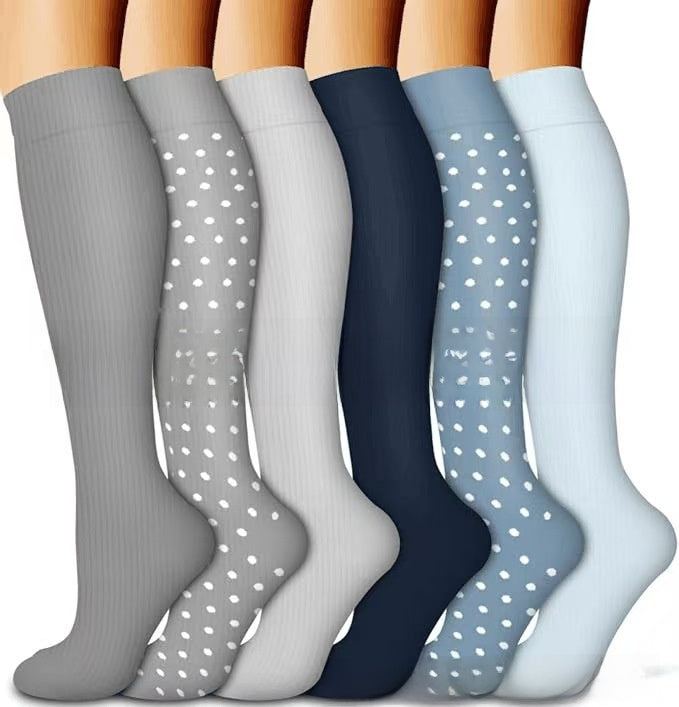 Set of knee high compression socks in botanical and animal print designs