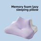 Contour memory foam pillow supporting the head of a side sleeper
