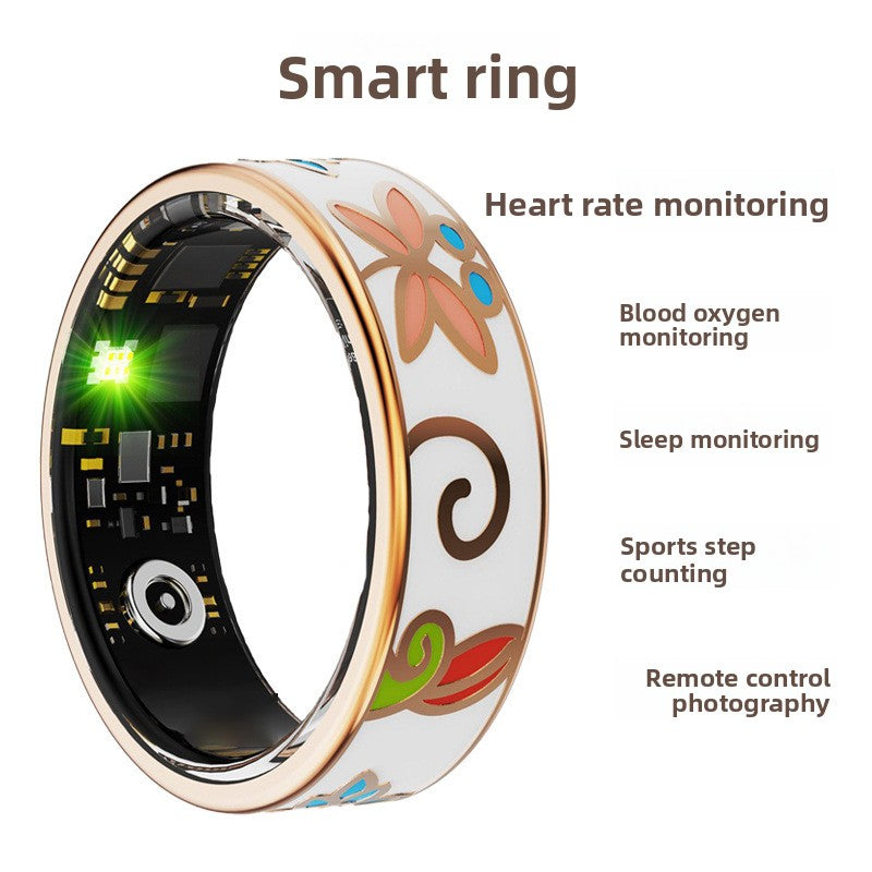 Floral enamel smart ring showing inner sensor circuit and green tracking light