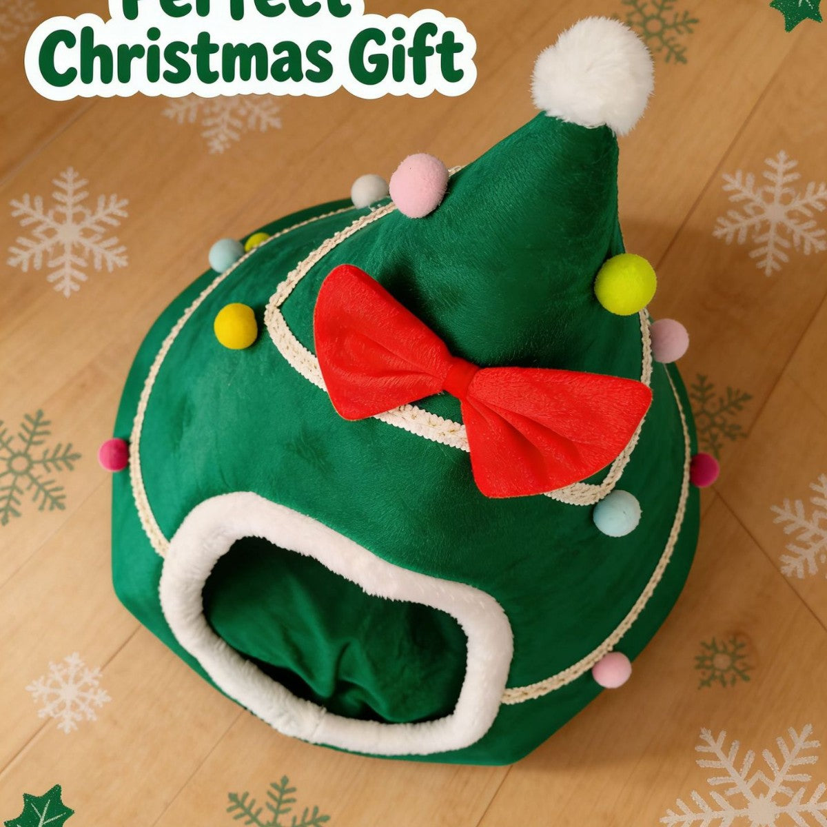 Top view of the green Christmas tree pet den with its bobble and bow
