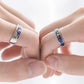 Starry Night ring styled on a finger with the blue and gold panel facing up