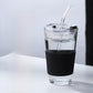 Top down view of the lid with straw inserted in the center