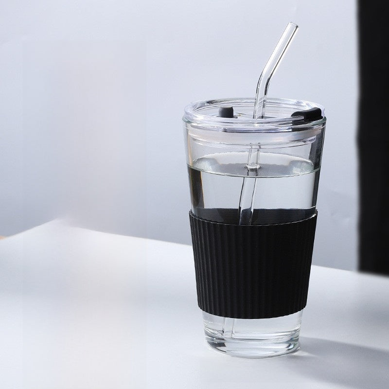 Top down view of the lid with straw inserted in the center