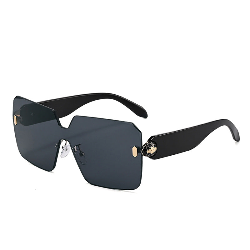 Squared shield sunglasses with a notched bridge and no rim on any lens edge