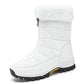 White plush lined snow boot with round toe and blocky lugged outsole on white