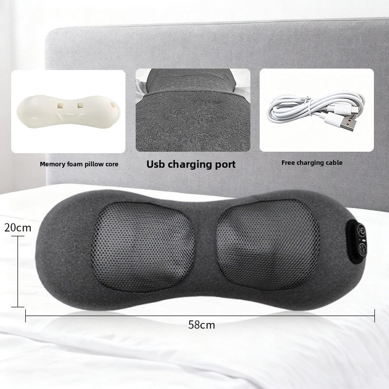 Lumbar massage pillow held against a person lower back as a fit and scale reference