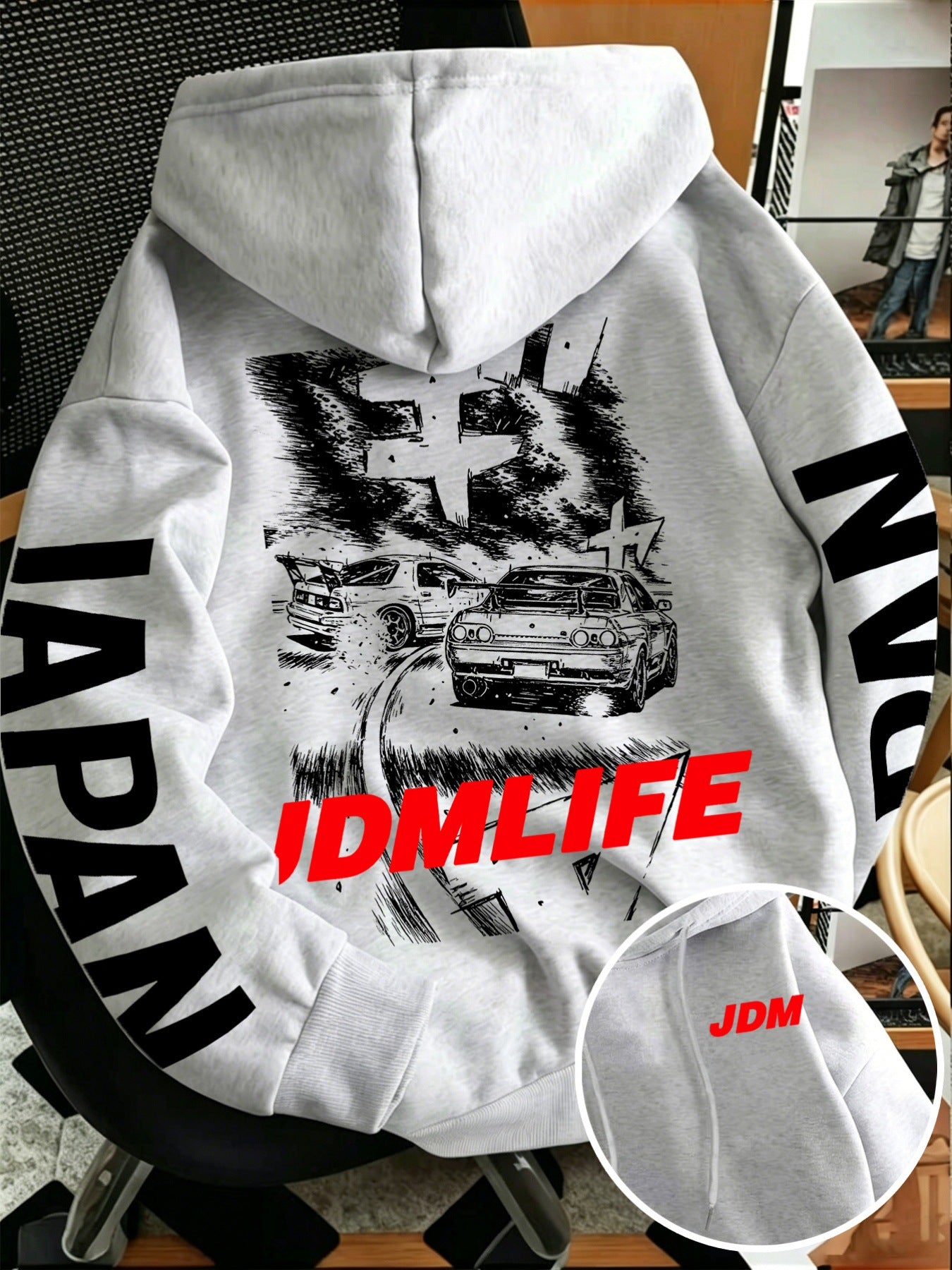 JDM drift hoodie back print with silhouetted cars on a mountain road and red JDMLIFE text