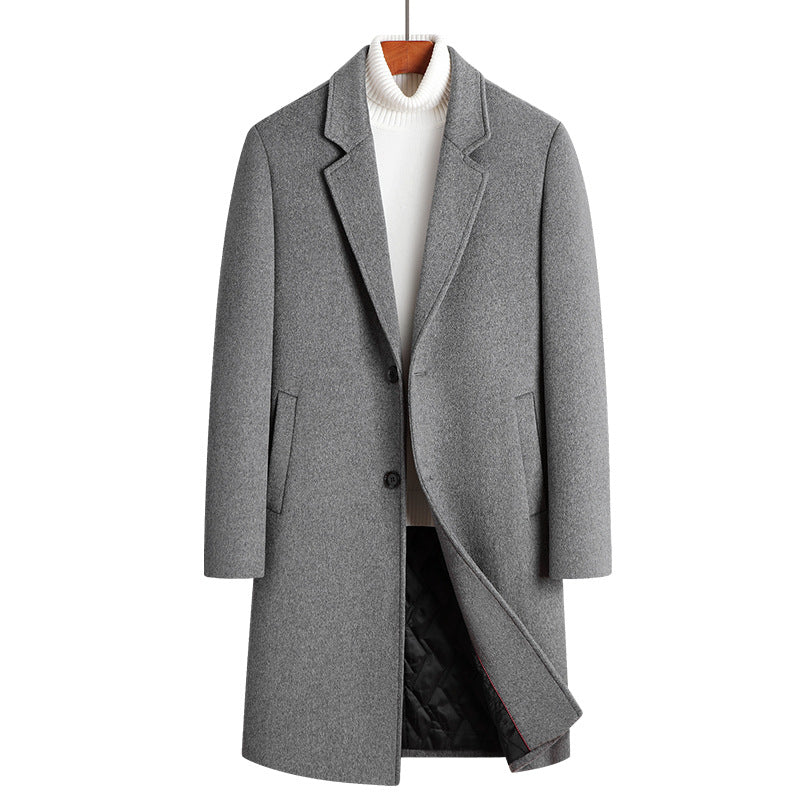 Gray single-breasted long coat with notch lapel and two buttons over a white turtleneck, size 185/2X option