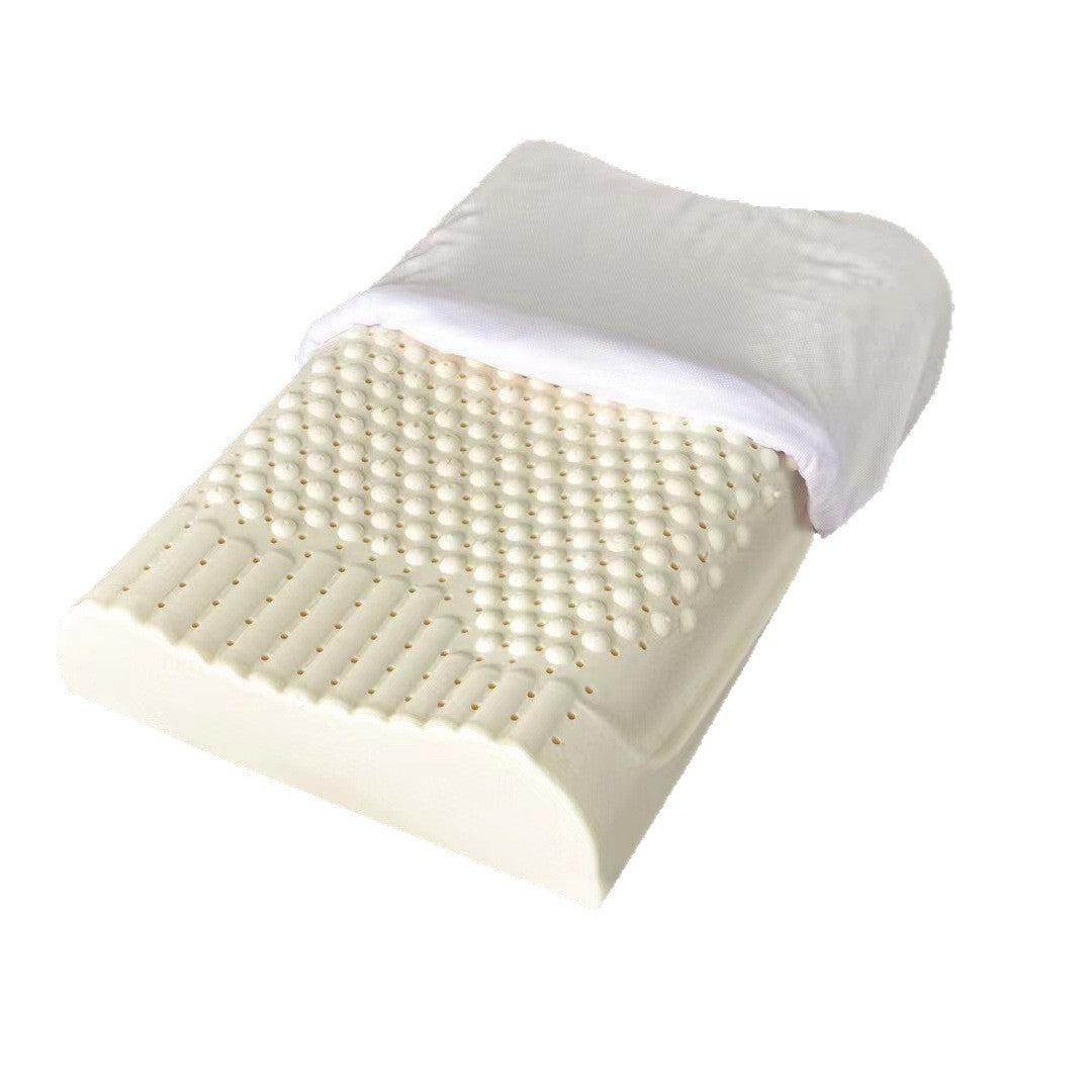 Cream contour latex pillow core showing pincore holes and a nub and ribbed surface