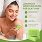 Tea tree oil cleansing bar lathered into a light foam during washing