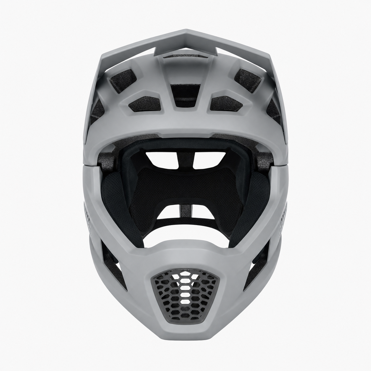 Front view of the MTB helmet showing vents and detachable chin bar