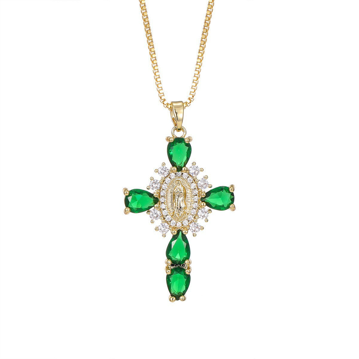 Gold tone cubic zirconia cross pendant necklaces shown side by side on a ceramic tray