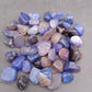 Larger tumbled agate stones in mixed colours for landscaping accents