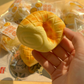 Close-up of the crackle top texture on the soft foam pineapple bun squishy