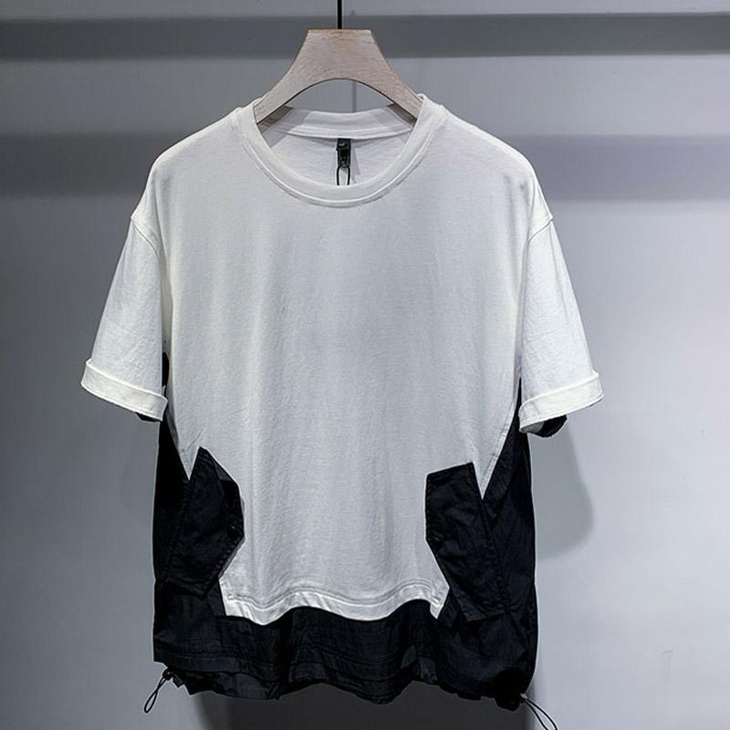 White colorway of the panel t-shirt with black woven inserts at the lower hem