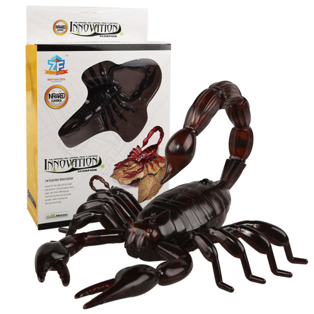 Molded plastic critter cat toy with a remote handset for interactive play