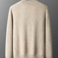 Back of the camel knit cardigan on a hanger showing the plain back, ribbed collar, cuffs and hem