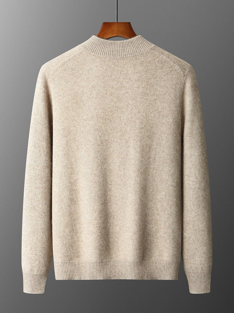 Back of the camel knit cardigan on a hanger showing the plain back, ribbed collar, cuffs and hem