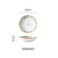 Gold-tone rim detail along a green leaf porcelain bowl edge