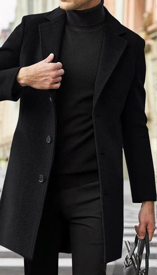 Man in a black single-breasted mid-length coat with notch lapel holding a bag on a city street, size XXXL option