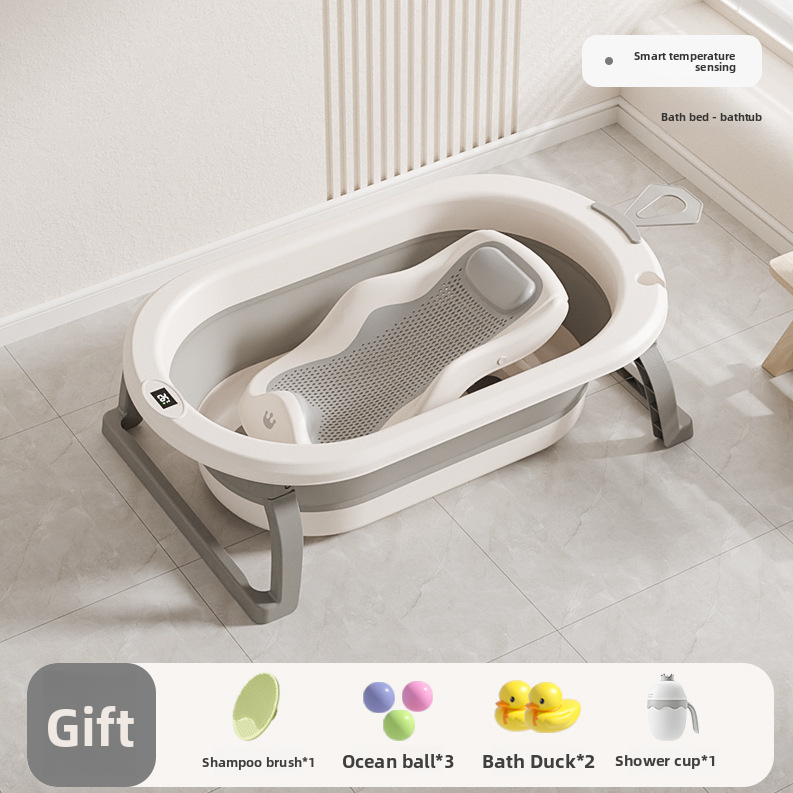 Cream gray baby bathtub with mesh bath rack and gift pack of shampoo brush, balls, ducks and shower cup
