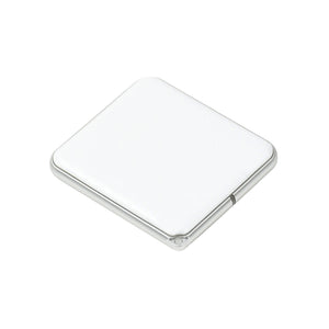 Back of the NFC e-ink screen showing white shell, brushed aluminum rim and corner keychain loop
