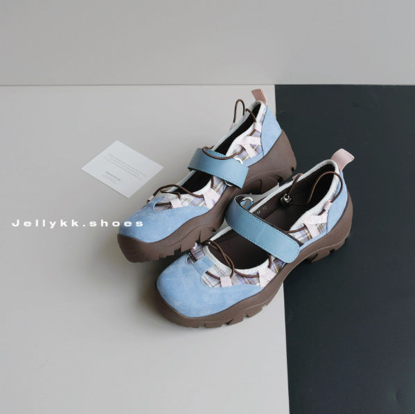 Sky blue platform slip-on shoes with a blue strap, patterned panels and a brown lug sole, EU size 40 option