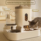 White gravity pet feeder with tall food hopper and clear water bottle beside the twin bowl base