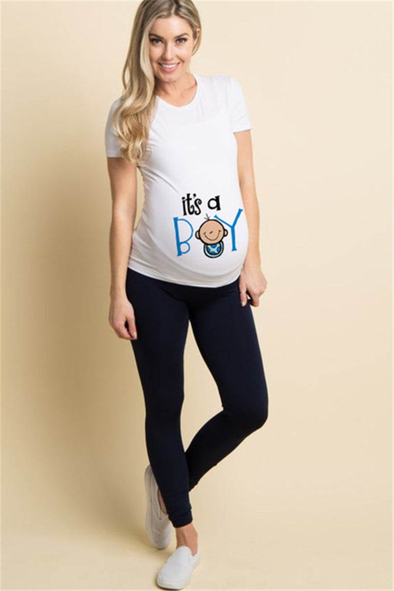 White maternity short sleeve tee with an It's a Boy print, round neck and side ruching, on a pregnant model