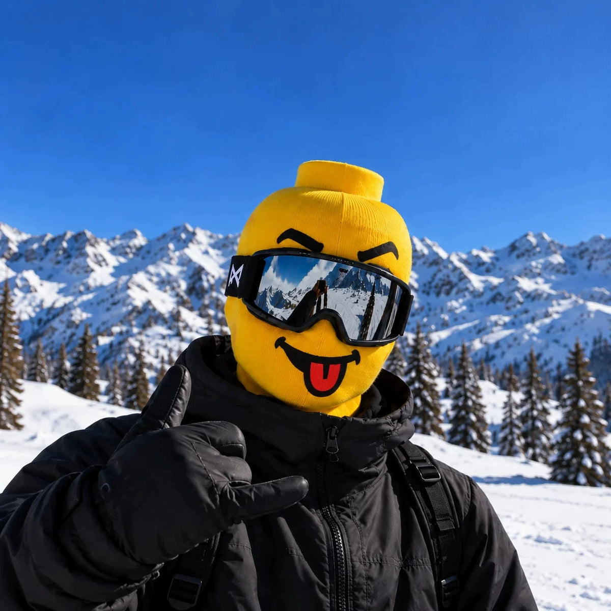 Building Man Mask 1 option: yellow block head face cover with tongue out, worn with ski goggles