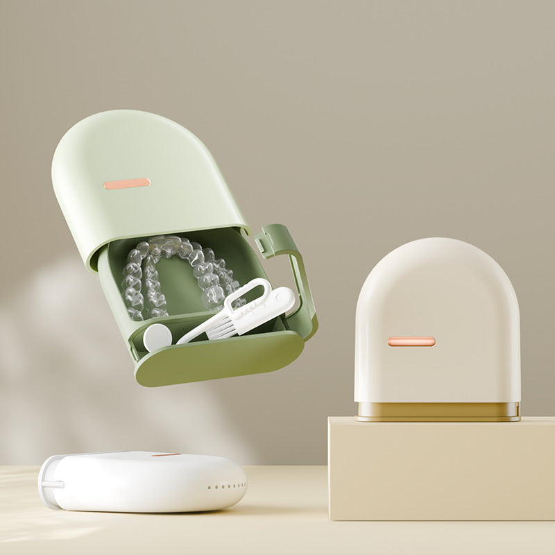 Compact rounded plastic retainer storage case in a soft color on a plain background