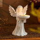 Close-up of the matte white sculpted surface and angel detail