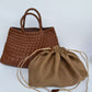 Light brown woven PU handbag with braided handles and drawstring pouch, Light brown variant