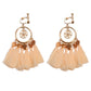 Boho vintage clip-on drop earrings with fringe and bead accents, zinc alloy build, studio image on white background