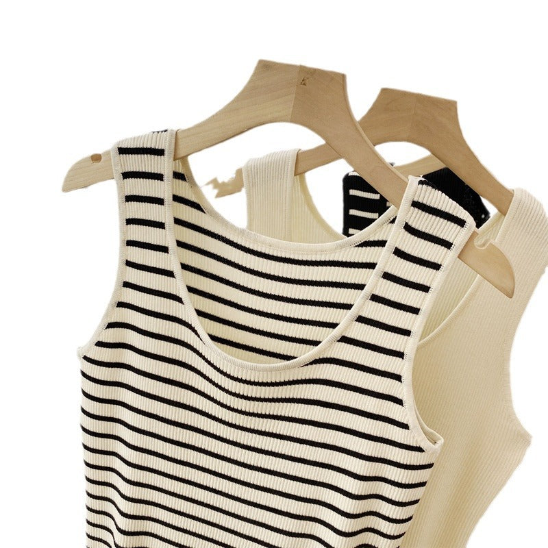 Striped sleeveless camisole worn in an everyday scene