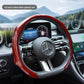 Red steering wheel cover fitted on a car wheel