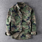 Men's washed camouflage long sleeve button shirt with two flap chest pockets three quarter flat lay
