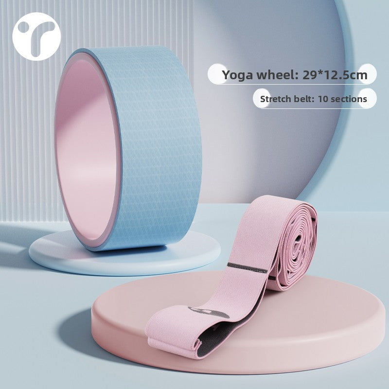 Resistance band placed next to a foam roller for a full mobility kit