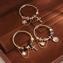 Womens Gold Tone Cross and Medallion Charm Cuff Bangle