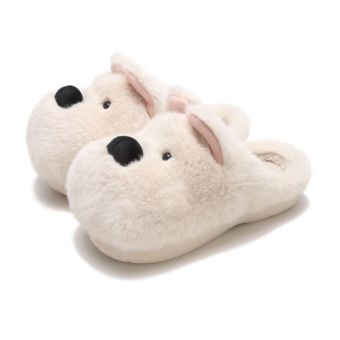 White puppy face plush slippers with pink ears and a black nose on a plain white background