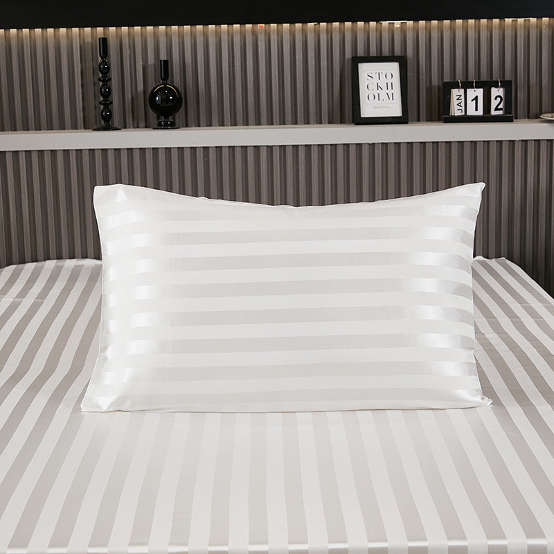 Black satin pillowcase shown flat to reveal the smooth weave