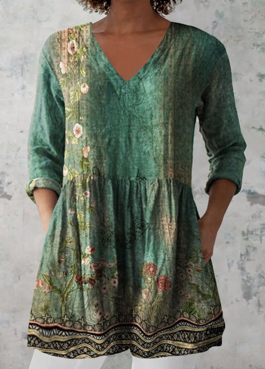 Digital print tunic with a soft V neckline with hidden side seam pockets at the hip