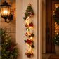 Christmas tree door hanger glowing on a porch pillar beside a lantern, Christmas tree option