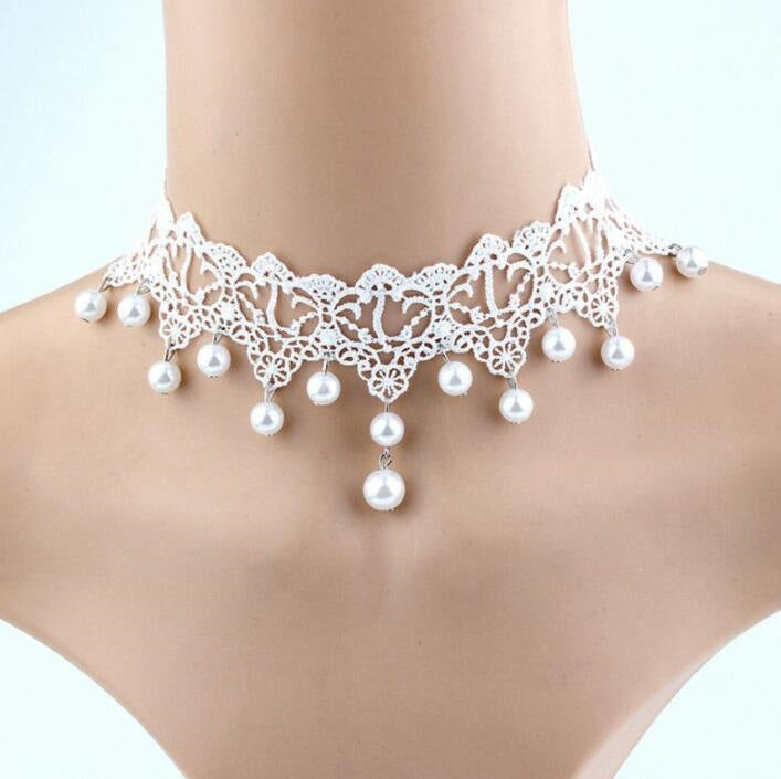 Vintage lace choker necklace displayed on a neck form against a plain backdrop