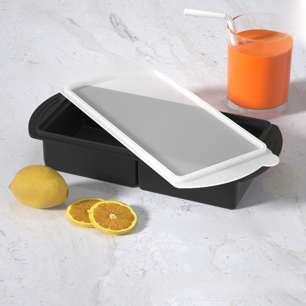 Flexible platinum silicone ice cube tray with round wells for chilled drinks