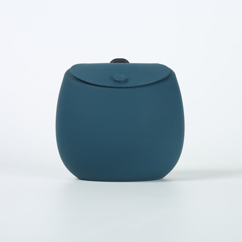 Silicone dog treat pouch open to show the soft flexible inside for treats